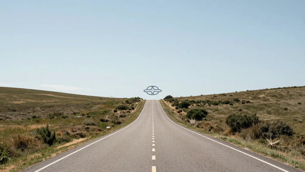 Distant hillside road leading to a distant property chain logo on horizon