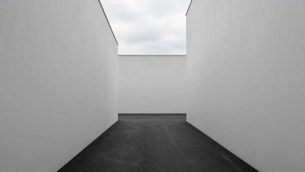 Elevated view of a single quiet cul-de-sac under overcast skies