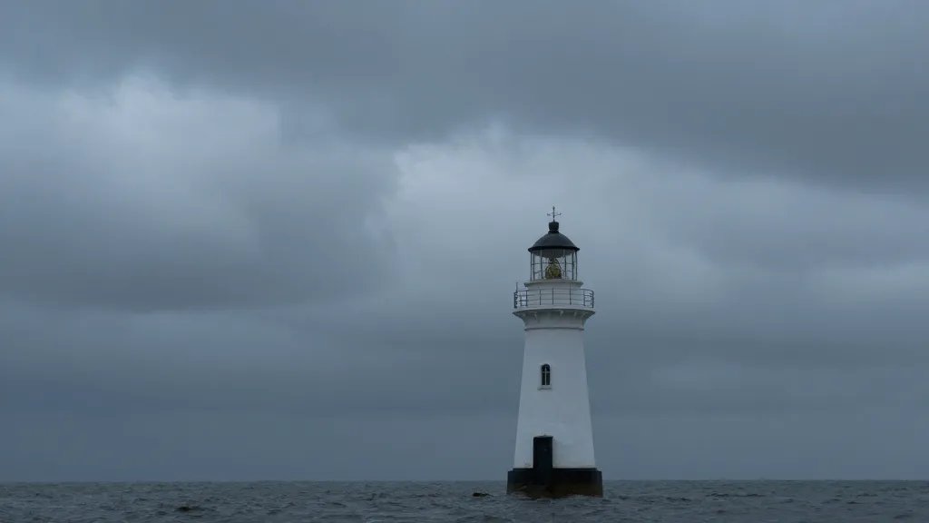 Isolated shoreline lighthouse against dramatic cloudy sky